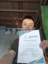 Mr Ball receiving cert from IT Foundations class