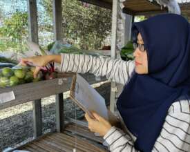 Vina checking each customers' order