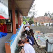 Repainting the front wall of YUM Library