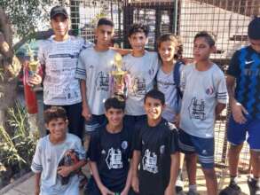 Shatila Camp team members after winning a cup