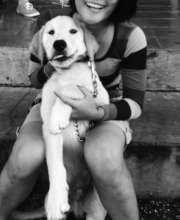 Ana* and Fluffy, our newest canine resident!