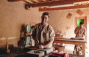 Train eight young Berber men in woodworking skills