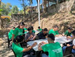 Marely leading an arts activity in EducARTE