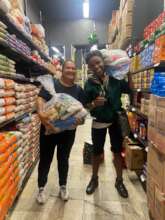 Entrepreneurs receiving food baskets
