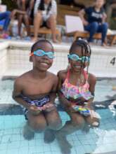 Siblings Swimming