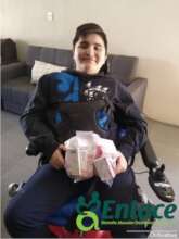 Erick receiving his medication