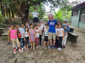 Adam Agee DART and Some Happy School Children