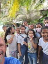 school children love the water and the camera