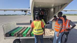 Loading Medical Oxygen Canisters for Haiti