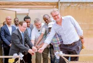 Cutting the ribbon ceremony, in the greenhouse