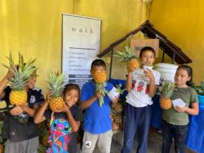 Kids witht their origamis and food!
