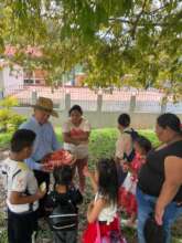 Fernando giving out watermelon pieces!