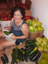 Bibi cleaning veggies and fruits at night