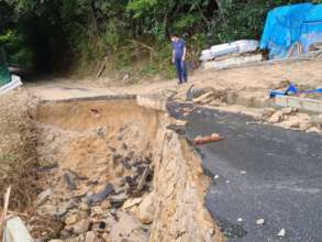 Road damaged by the torrential rains