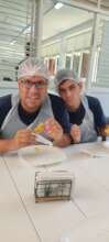 Gabriel and Moises making arepas