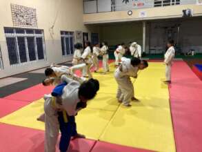 PAM and Community children practicing Judo