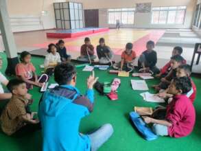 PAM and Community Children learning Music