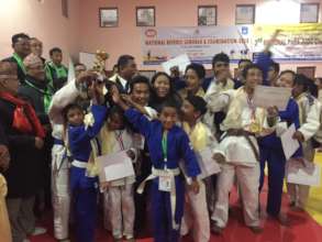 PAM and Community Children Expressing Joy after Wi