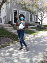 Moms receiving materials for class