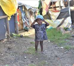 kid playing at their unsafe huts