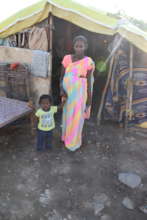 Pregnant Mother at their house