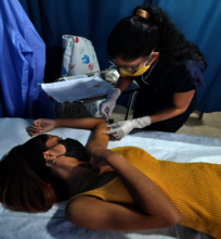 Yasiel receiving her contraceptive implant