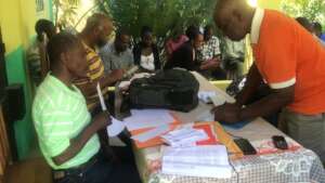 Members signing for relief funds