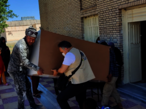 Distribution of items at refugee camps in Iran