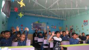 Afghan refugee children attending remedial classes