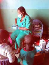 Irerero children receiving polio vaccine.