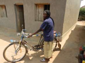 Woman entrepreneur with bicycle.