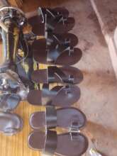 Sandals next to a sewing machine