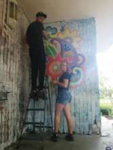 Mural drawing in the Kharkiv slums