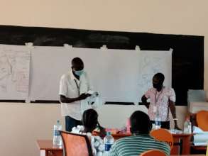 A man demonstrating how to use sanitary pads