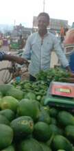 Faiza's father with her vegetable business