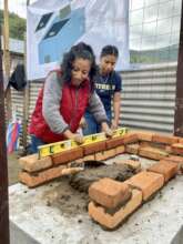 Anibela training a participant in December