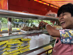 SILA resident buys a meal in the community