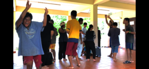 Residents dancing at a birthday celebration