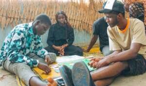 Teenagers Playing Monopoly during FLiC Session