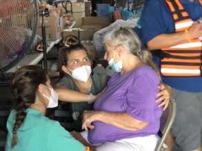 The team attends to a patient