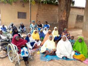 Omotunde and GIEVA Surveying the community