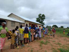 queing to get tested for malaria
