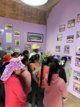 Elder in dialogue with children, SM Tequixtepec