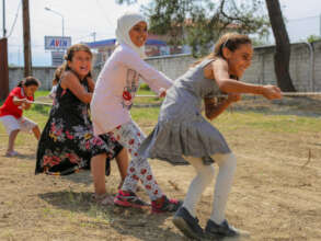 Young IRC clients enjoying a game of 'Tug of War'.