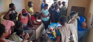 Crowd of IDP women training in the office