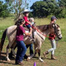 K's team as he rides Boo for the first time!