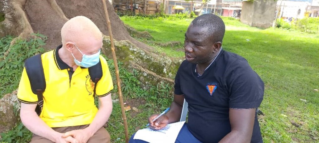 Caring advice for a young man in the Budaka clinic