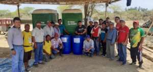Peru- small farmers with the composting tanks
