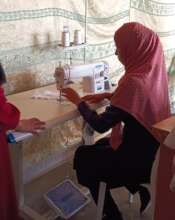 Bedouin woman learning new skills in the sewing