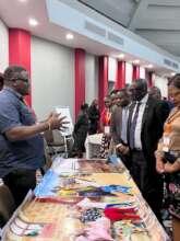 Ackson presenting at CARE Climate Adaptation Event